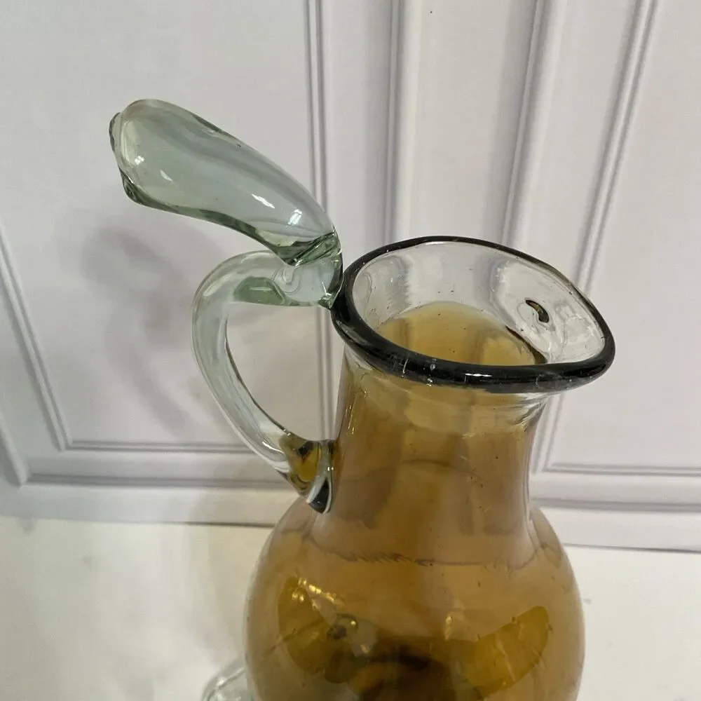 Hand Blown Glass Amber Pitcher with attached Clear Handle 10.5”Tall Clear Base